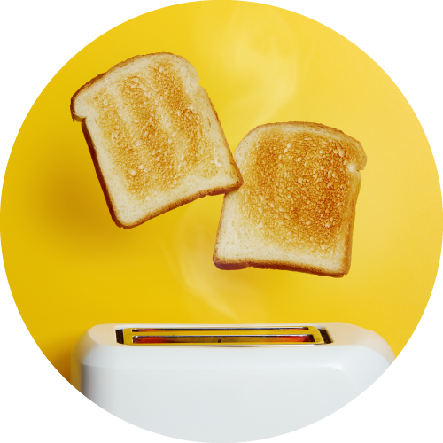 Photo of 2 pieces of toast flying out of a toaster to show particle event
